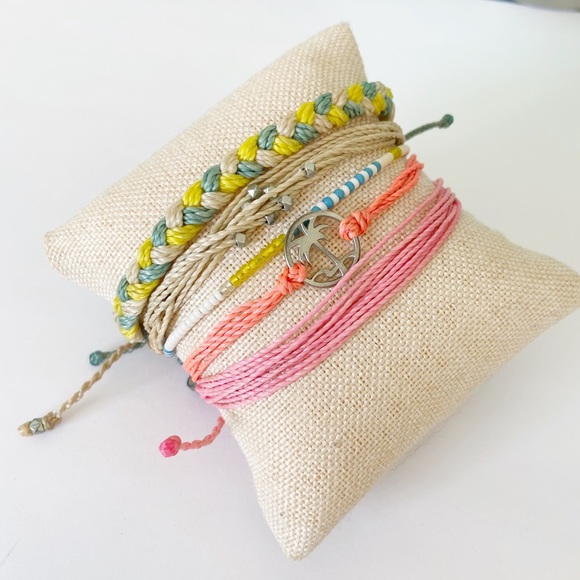 Pura Vida Jewelry - Pura Vida set of 5 adjustable corded bracelets- pink, yellow blue, tan